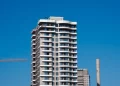 E1 settlement project UK